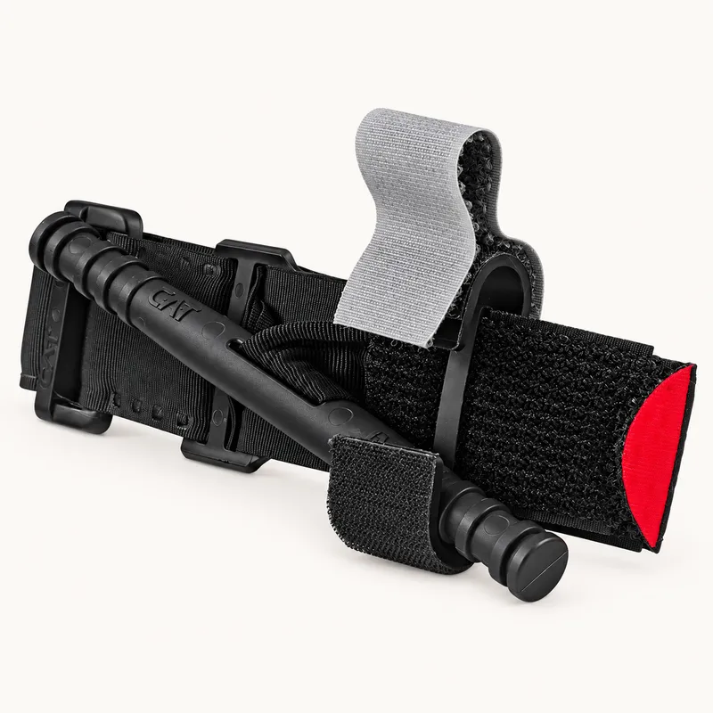 Combat Application Tourniquet (C-A-T) on a plain background. Named device only. No injury imagery.